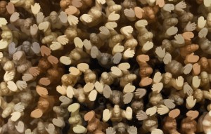 figurines-holding-up-glass-floor