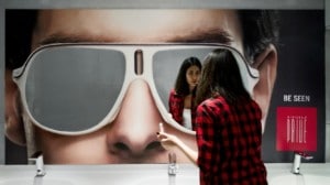 Sunglasses-Bathroom-Advertising-Sign