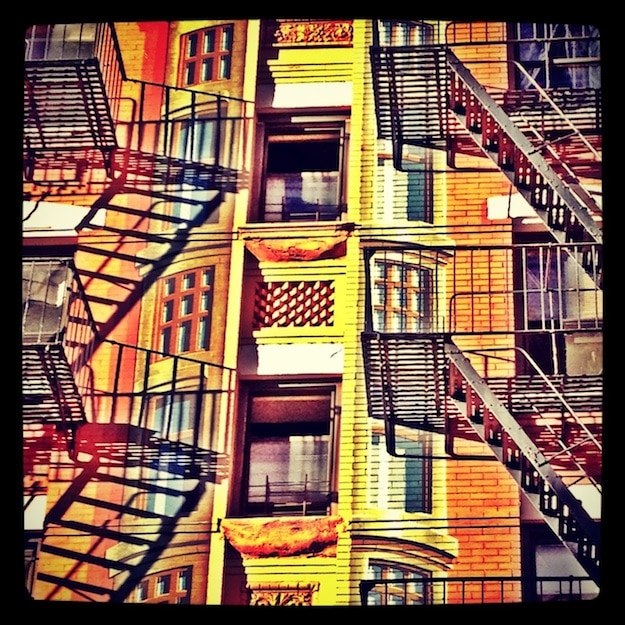 Street Art: New York Gargoyle Building Sings The Blues