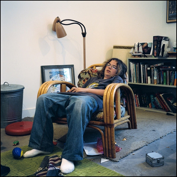 12 Very Strange Photographs Of People Watching Television