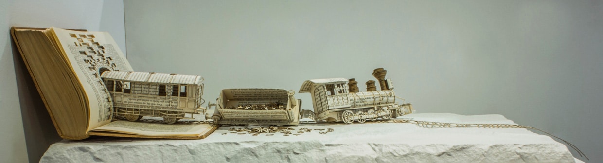 Book Sculpture Illustrates OCD With A Derailed Typography Train Book Sculpture Illustrates OCD With A Derailed Typography Train
