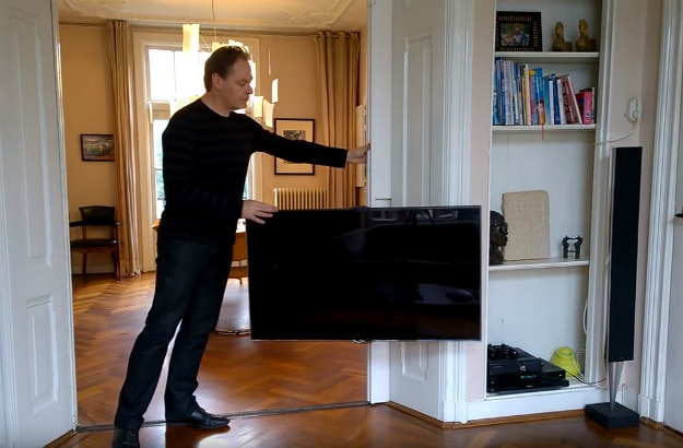 Television Mounted In Sliding Door Is Cleverness Defined Television Mounted In Sliding Door Is Cleverness Defined