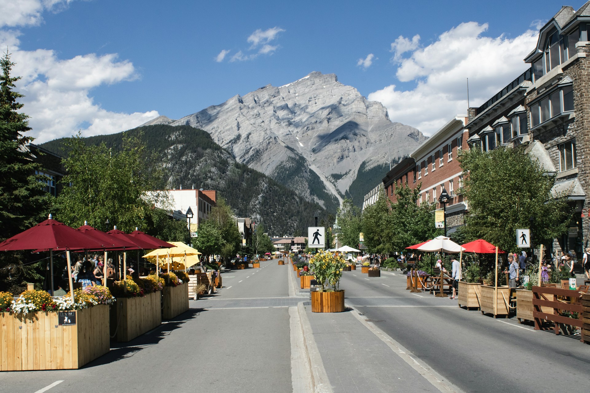Walkable mountina towns with restaurants, people, and pedestrians